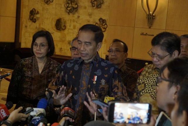 Presiden Indonesia Joko Widodo usai membuka Rapat Koordinasi Nasional Tim Percepatan Akses Keuangan Daerah dan Silaturahmi  Nasional Bank Wakaf Mikro. Foto: Helmi Afandi Abdullah/kumparan