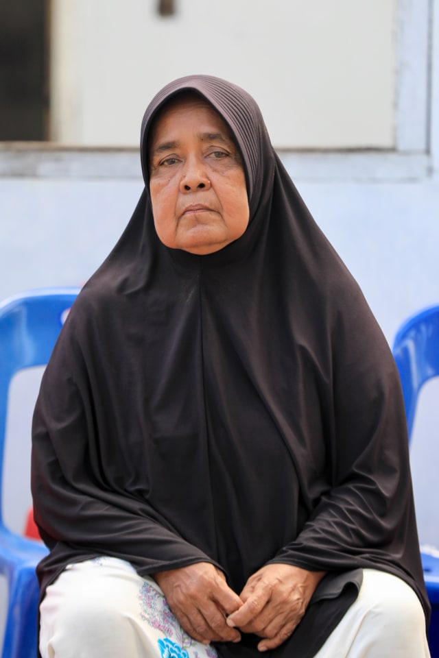Mariana, penyintas Tsunami Aceh yang menjadi pemandu di situs tsunami Kapal di Atas Rumah, Lampulo, Banda Aceh. Foto: Suparta/acehkini 