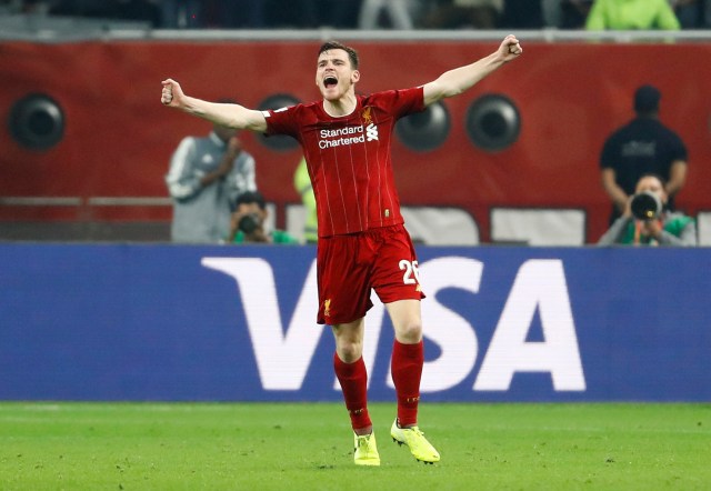 Andrew Robertson berselebrasi usai Liverpool memenangkan Piala Dunia Antarklub. Foto: REUTERS/Kai Pfaffenbach