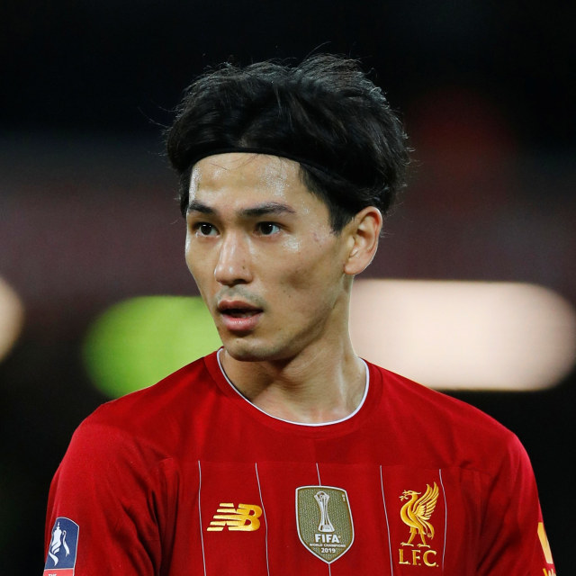 Takumi Minamino melakoni debutnya bersama Liverpool di laga kontra Everton. Foto: Phil Noble/REUTERS
