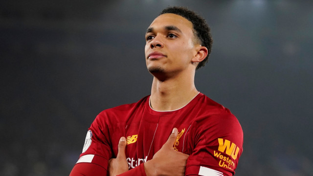 Trent Alexander-Arnold dengan selebrasi ala Kylian Mbappe. Foto: Reuters/Andrew Yates