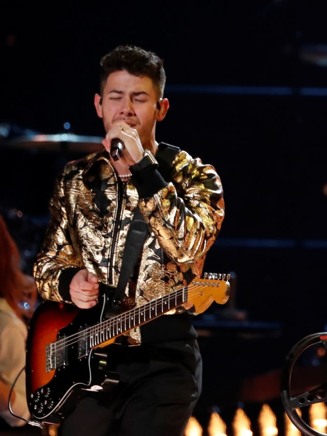Penampilan Nick Jonas pada Grammy Awards ke-62 di Los Angeles, California, Amerika Serikat.  Foto: REUTERS / Mario Anzuoni