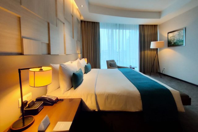 Suasana kamar Premium Club di Hotel Crowne Plaza Bandung.
 Foto: Helinsa Rasputri/kumparan