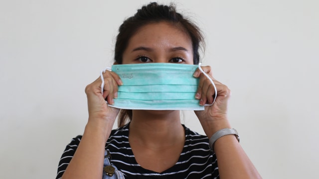Ilustrasi penggunaan masker. Foto: Aditia Noviansyah/kumparan