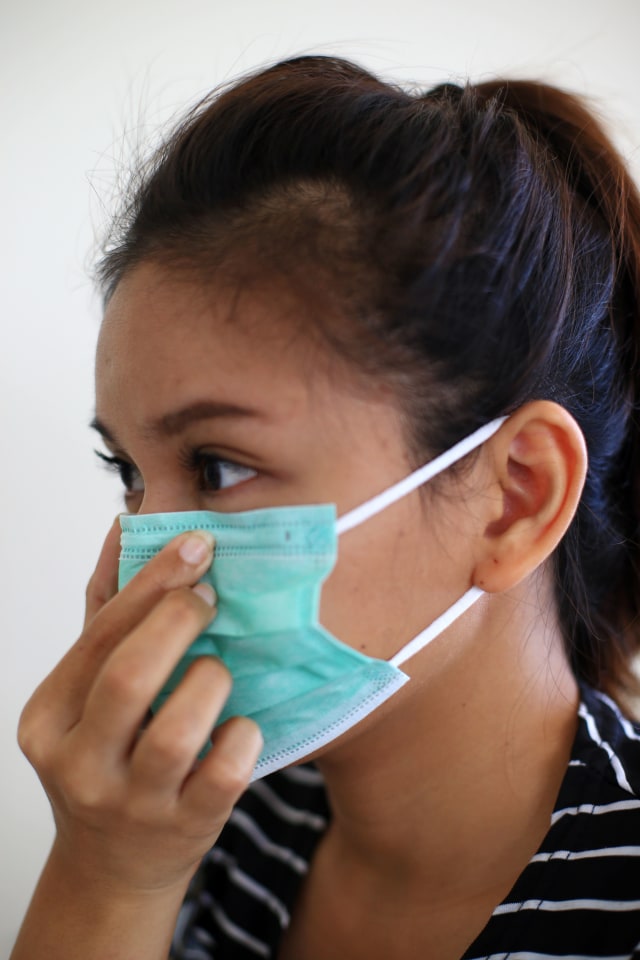 Ilustrasi memakai masker. Foto: Aditia Noviansyah/kumparan