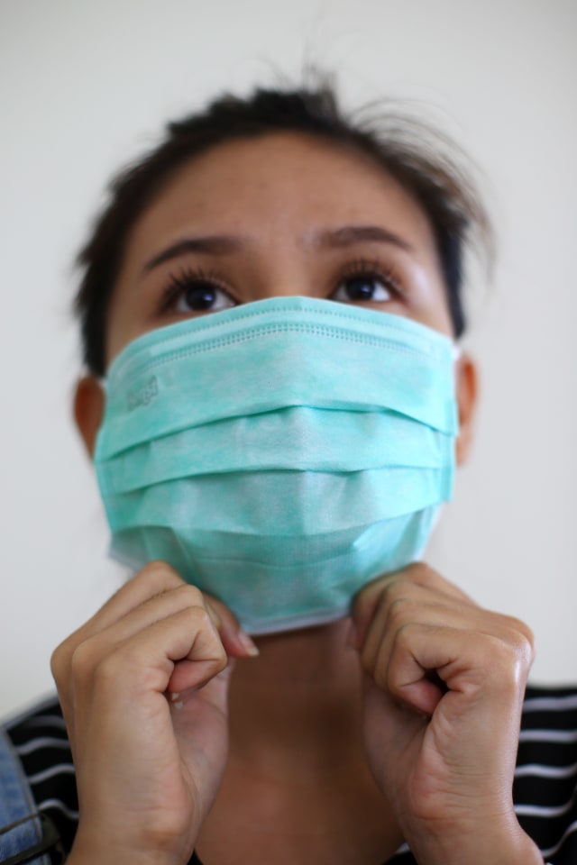 Ilustrasi memakai masker. Foto: Aditia Noviansyah/kumparan