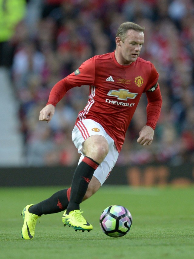 Wayne Rooney ketika berseragam Manchester United.  Foto: AFP/OLI SCARFF