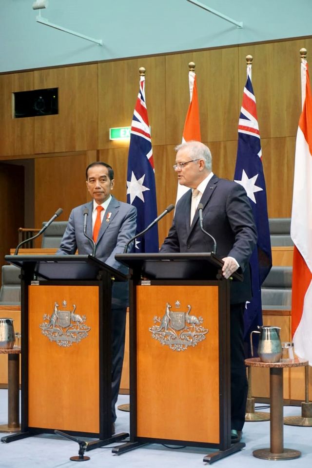 Presiden Jokowi dan PM Australia Scott Morrison menggelar pernyataan pers bersama terkait kerja sama Indonesia-Australia. Foto: Fahrian Saleh/kumparan