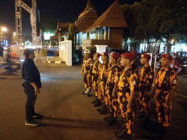 Anggota Pemuda Pancasila menerima arahan sebelum pelaksanaan MTQ di Pontianak. Foto: Dok Hi!Pontianak