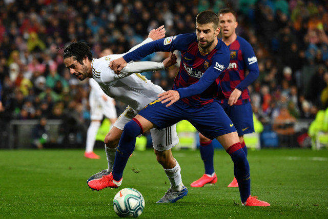 Pertandingan antara Real Madrid vs Barcelona di stadion Santiago Bernabeu, Madrid. Foto: AFP/GABRIEL BOUYS
