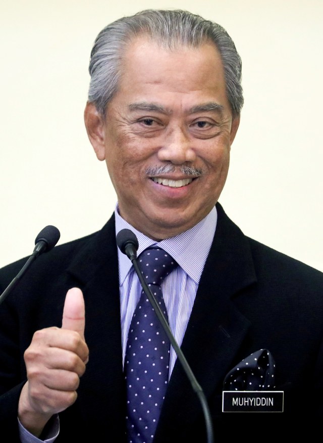 Perdana Menteri Malaysia Muhyiddin Yassin saat umumkan susunan kabinet baru di Putrajaya, Malaysia. Foto: REUTERS / Lim Huey Teng