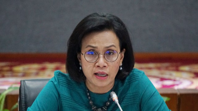 Menteri Keuangan Sri Mulyani memberikan paparan saat konferensi pers terkait dampak virus corona di Kantor Kemenko Perekonomian, Jakarta, Jumat (13/3). Foto: Jamal Ramadhan/kumparan
