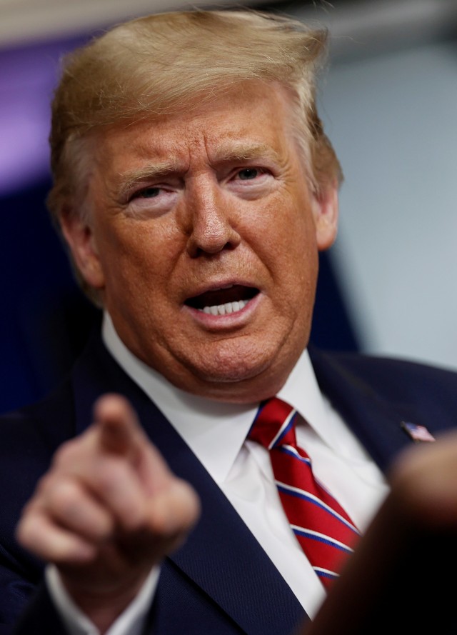 Presiden Amerika Serikat Donald Trump menyampaikan tanggapan tentang virus corona di Gedung Putih, Washington, Amerika Serikat.  Foto:  REUTERS / Jonathan Ernst