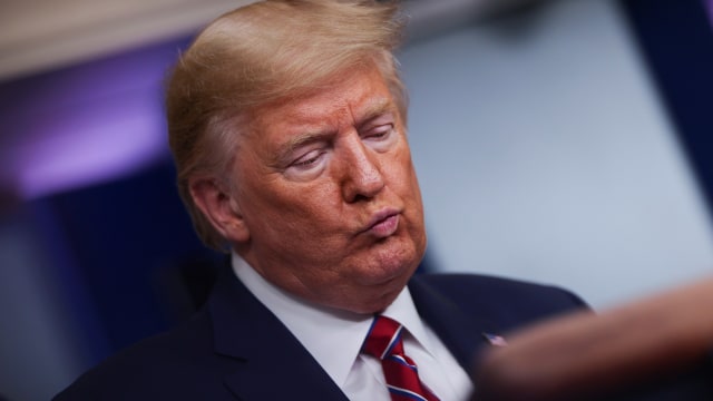 Presiden Amerika Serikat Donald Trump menyampaikan tanggapan tentang virus corona di Gedung Putih, Washington, Amerika Serikat.  Foto:  REUTERS / Jonathan Ernst