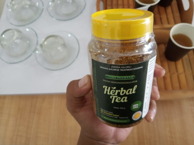 Kemasan teh daun pepaya dlam bentuk botol - KR14