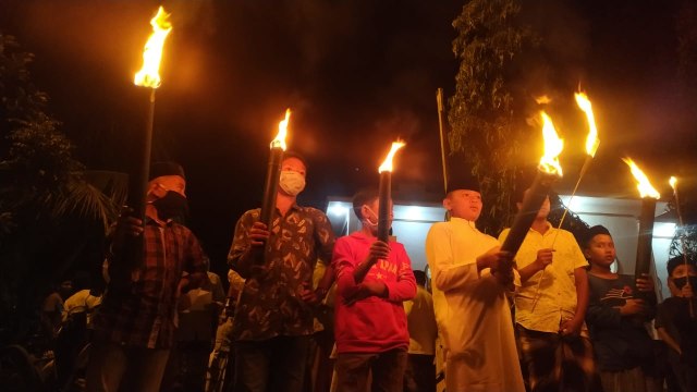 Ritual tolak bala wabah Corona di Desa Gla Meunasah Baro, Krueng Barona Jaya, Aceh Besar. Foto: Adi Warsidi/acehkini