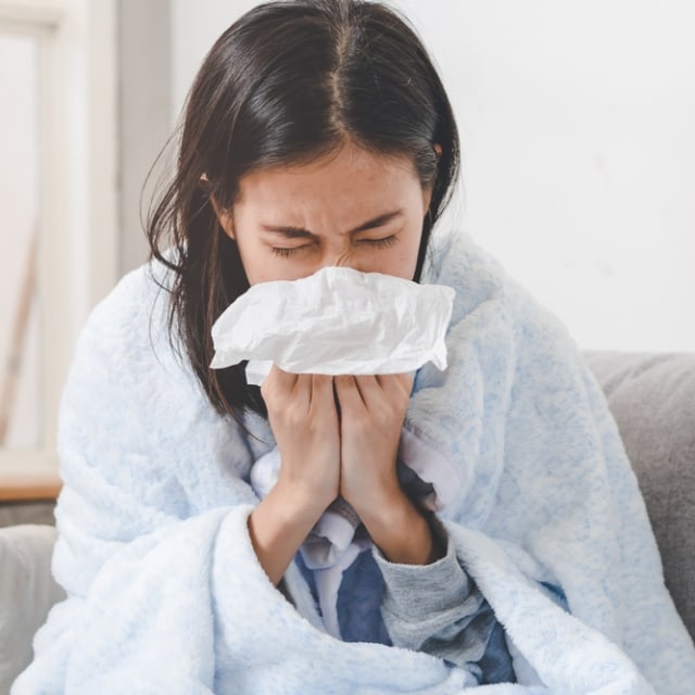 Seseorang yang sedang terkena flu. Foto: Shutter Stock