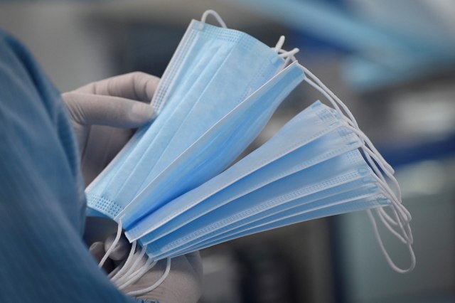 Ilustrasi masker. Foto: AFP/Wang Zhao