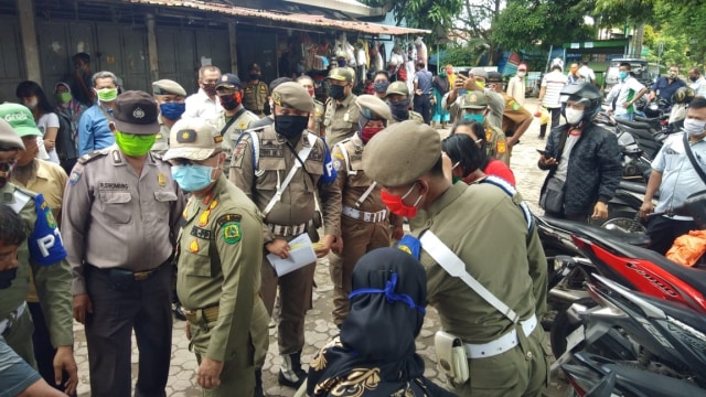 Ilustrasi Satpol PP Kota Medan yang sedang razia PPKM Darurat. Foto: Dok. Istimewa