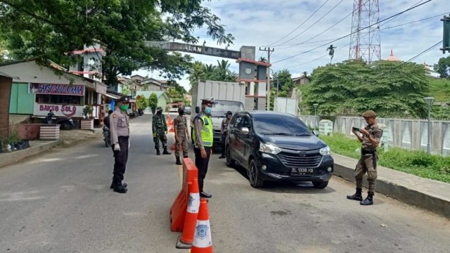 40 mobil angkutan umum dan pribadi dari Sumut dilarang masuk ke Aceh. Foto: Dok, Dirlantas Polda Aceh