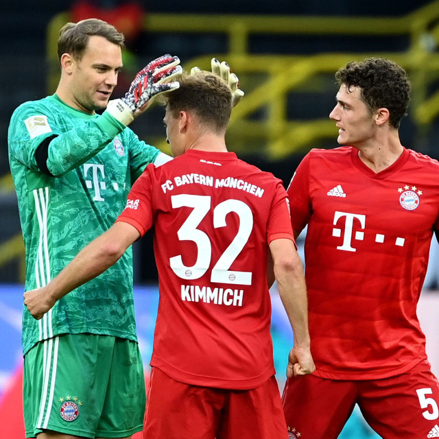 Manuel Neuer, Joshua Kimmich, dan Benjamin Pavard. Foto: Federico GAMBARINI/POOL/AFP