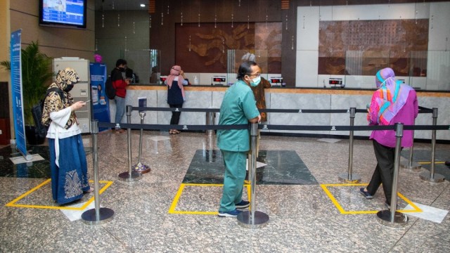 Ilustrasi menjaga jarak sosial di bank. Foto: Dok. BRI
