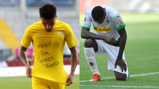 Jadon Sancho dan Marcus Thuram pro George Floyd. Foto: Lars Baron & Martin Meissner / POOL / AFP