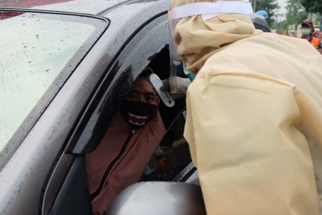 Ilustrasi COVID-19. Foto: Rizal Adhi.