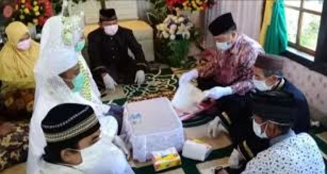 Pelaksanaan akad nikah sesuai protokol Kemenag saat pandemi covid-19. /Twitter @kemenag_RI