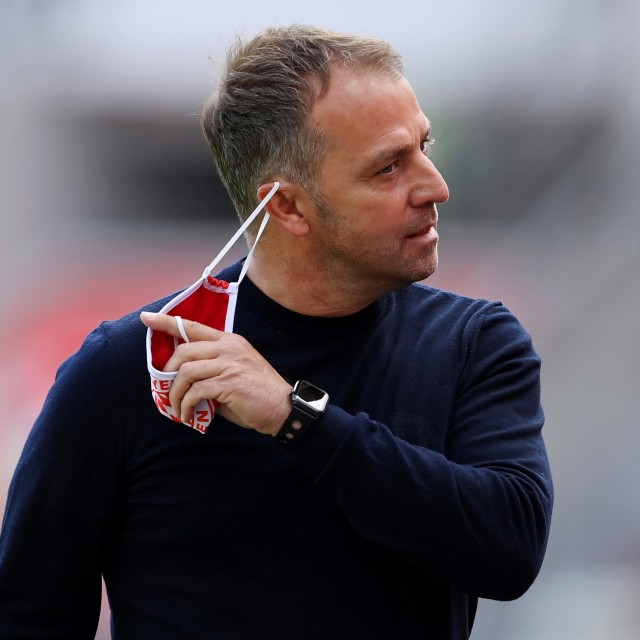 Hansi Flick siap persembahkan gelar Bundesliga untuk Bayern Muenchen. Foto: Matthias Hangst/POOL/AFP