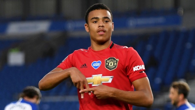 Pemain Manchester United Mason Greenwood merayakan mencetak gol pertama mereka ke gawang Brighton & Hove Albion. Foto: Mike Hewitt/Pool via REUTERS