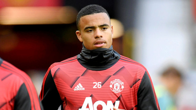 Pemain Manchester United Mason Greenwood saat pemanasan sebelum bertanding melawan Southampton, di Stadion Old Trafford, Manchester, Inggris. Foto: Pool via REUTERS/Peter Powell 