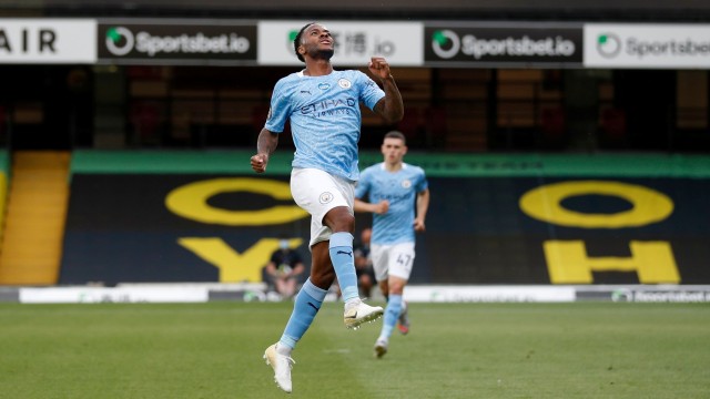 Selebrasi Pemain Manchester City  Raheem Sterling usai mencetak gol ke gawang Watford pada lanjutan Premier Legaue di Stadion Vicarage Road, Watford, Inggris. Foto: Adrian Dennis / REUTERS