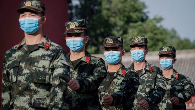 Ilustrasi tentara China. Foto: NICOLAS ASFOURI/AFP