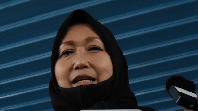 Pengacara dari buronan kasus korupsi pengalihan hak tagih (cessie) Bank Bali Djoko Tjandra, Anita Kolopaking usai menjalani pemerikaan di Gedung Jaksa Agung Muda Pengawasan Kejagung, Jakarta. Foto: Indrianto Eko Suwarso/ANTARA FOTO