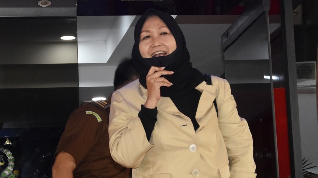 Pengacara dari buronan kasus korupsi pengalihan hak tagih (cessie) Bank Bali Djoko Tjandra, Anita Kolopaking usai menjalani pemerikaan di Gedung Jaksa Agung Muda Pengawasan Kejagung, Jakarta. Foto: Indrianto Eko Suwarso/ANTARA FOTO
