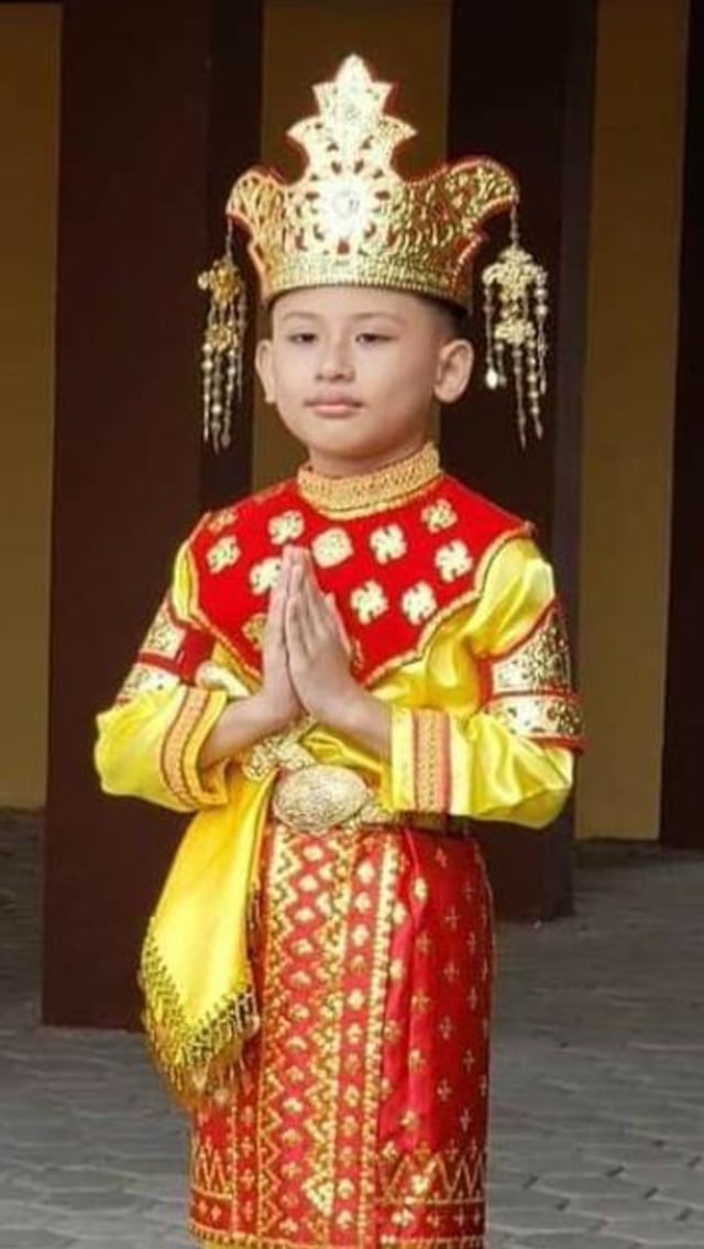 Model pakaian adat suku Tidung di Kalimantan Utara jadi bagian dari uang rupiah khusus Rp 75.000. Foto: Dok. Istimewa