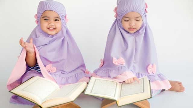 ilustrasi anak membaca Alquran Foto: Shutterstock