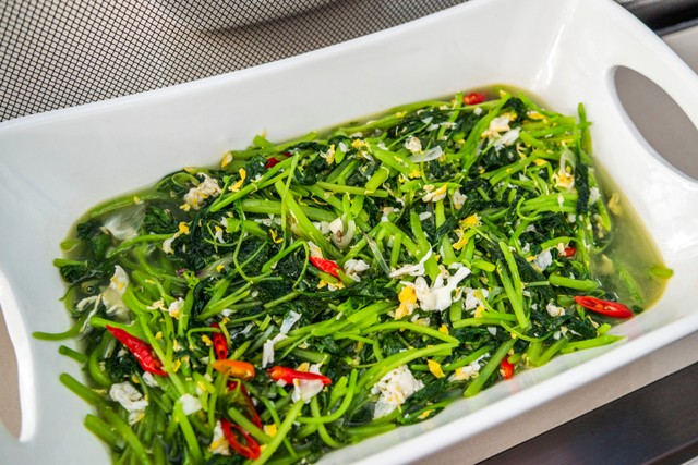 Ilustrasi tumisan bayam Foto: Dok.Shutterstock