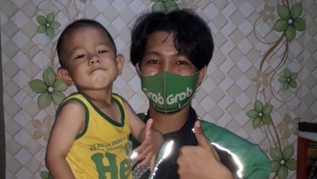 Ryan dan anaknya.
Foto: Dok. Istimewa