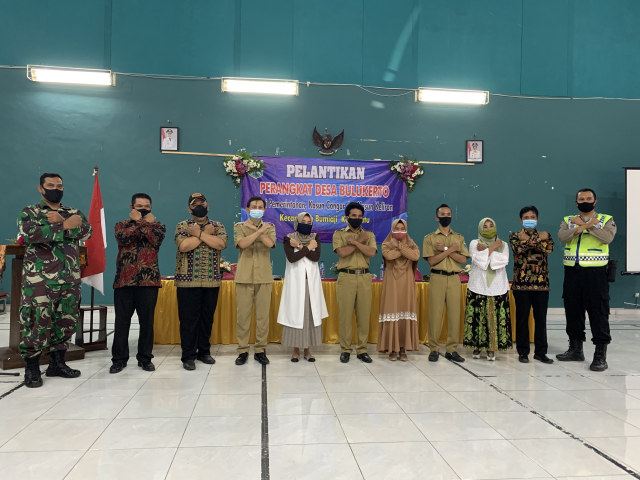 Mahasiswa PMM UMM Terapkan 3M Pada Acara Pelantikan Perangkat Desa 