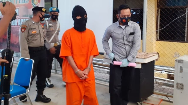 Pemerkosa anak di bawah umur saat berada di Polresta Banda Aceh. Foto: acehkini