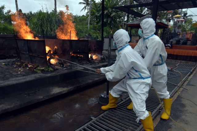 Ilustrasi proses kremasi jenazah pasien COVID-19. Foto: Nyoman Hendra Wibowo/Antara Foto
