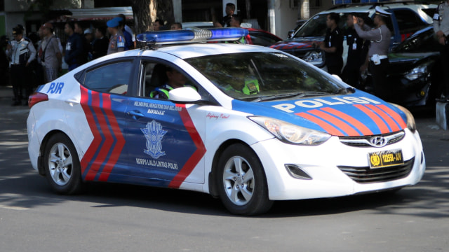 Ilustrasi mobil patroli dan pengawalan. Foto: Shutterstock