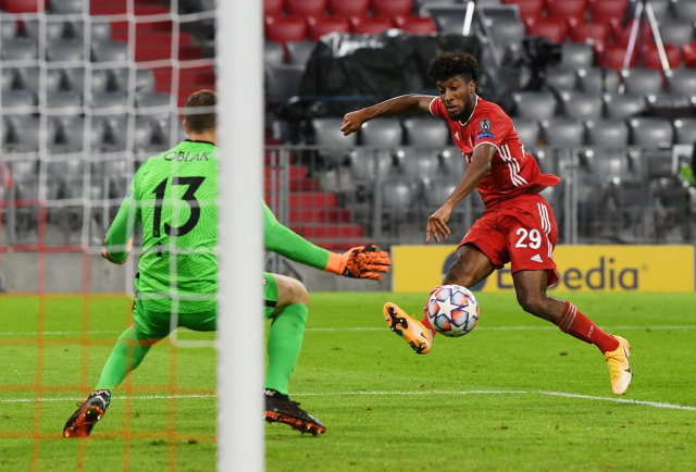 Pemain Bayern Munich, Kingsley Coman saat pertandingan melawan Atletico Madrid. Foto: Andreas Gebert/Reuters