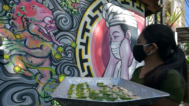 Ilustras virus corona di Bali. Foto: Nyoman Hendra Wibowo/Antara Foto