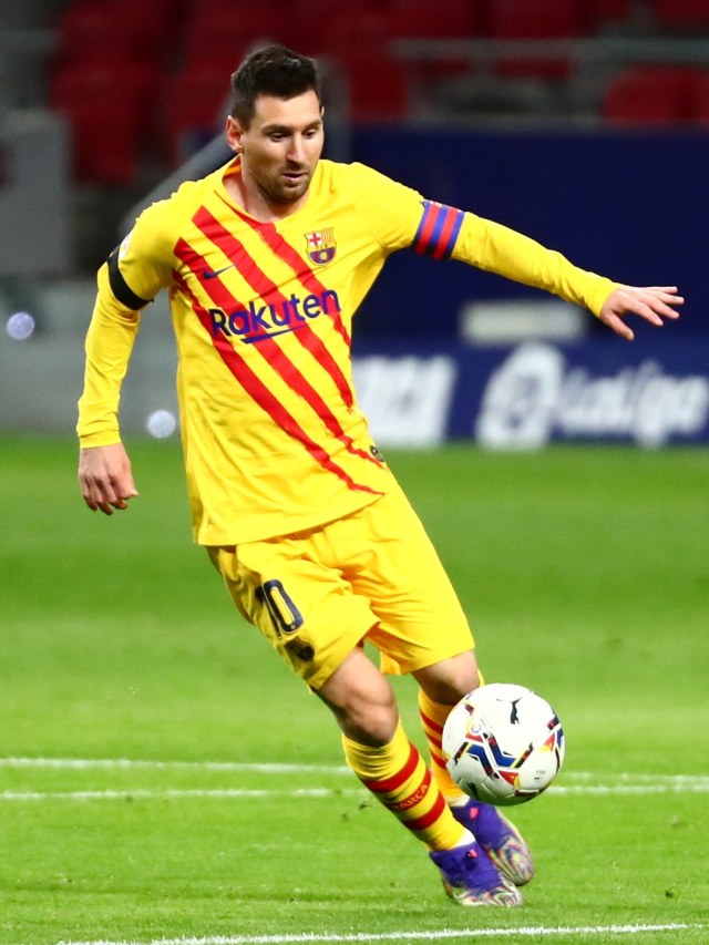 Pemain Barcelona Lionel Messi saat pertandingan Atletico Madrid vs FC Barcelona di Stadion Wanda Metropolitano, Madrid, Spanyol, Sabtu (21/11). Foto: Sergio Perez/REUTERS