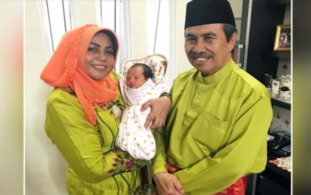 MISNARNI, istri Gubernur Riau dan Syamsuar, Gubernur Riau. 