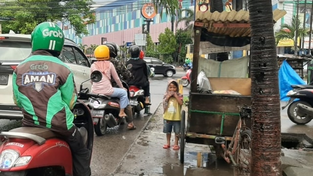 Seorang bocah pengemis di Makassar. Foto: Dok. Istimewa
