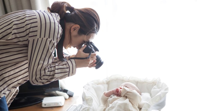 Ilustrasi bayi difoto menggunakan flash.
 Foto: Getyy Images